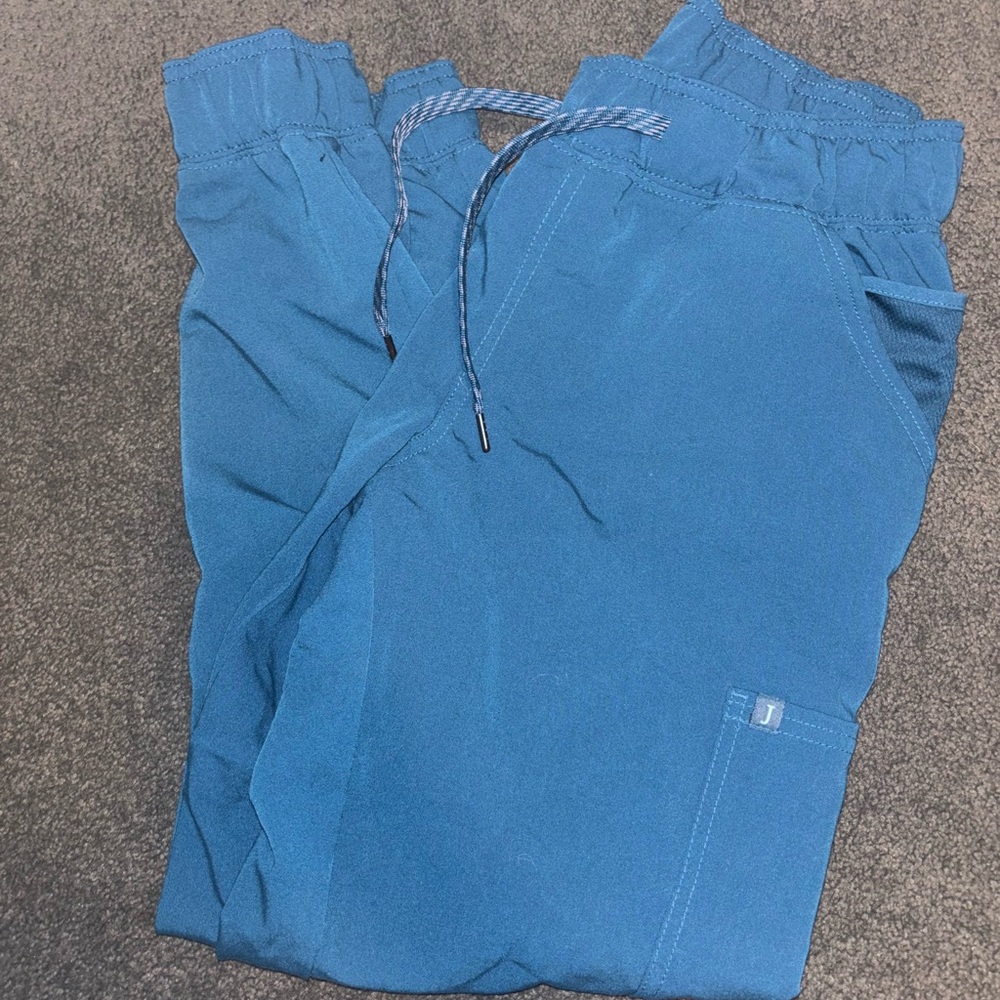 Jaanuu scrub bottoms both size small, teal blue and black joggers